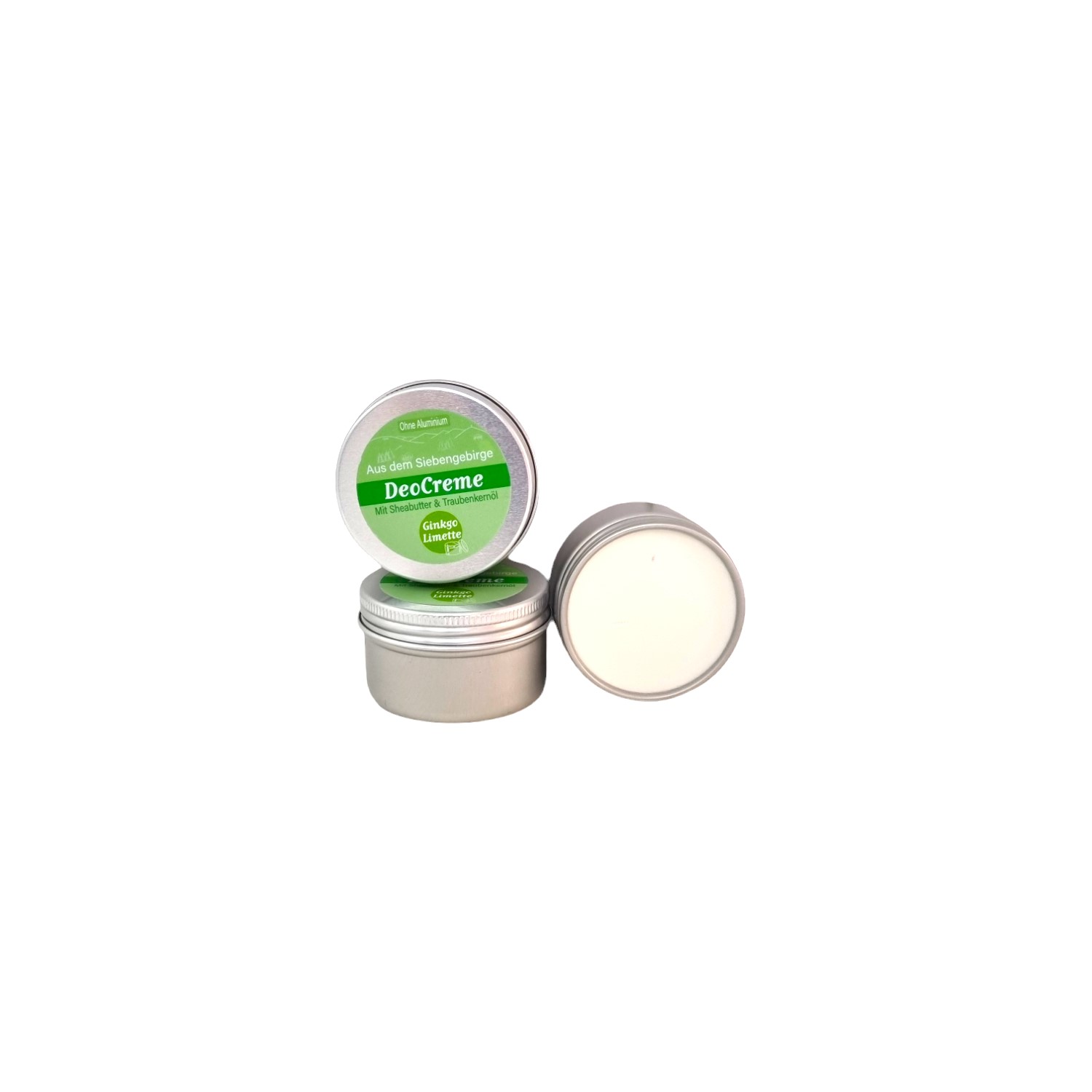 Im Focus : Runde Blechdose mit Schraubdeckel 50ml, mit grünem Rundetikett, gefüllt mit weißer Deocreme Gingko Limette